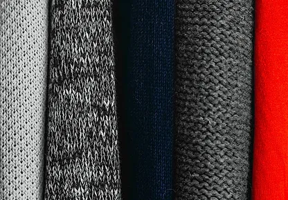 Tumpukan sweter rajut